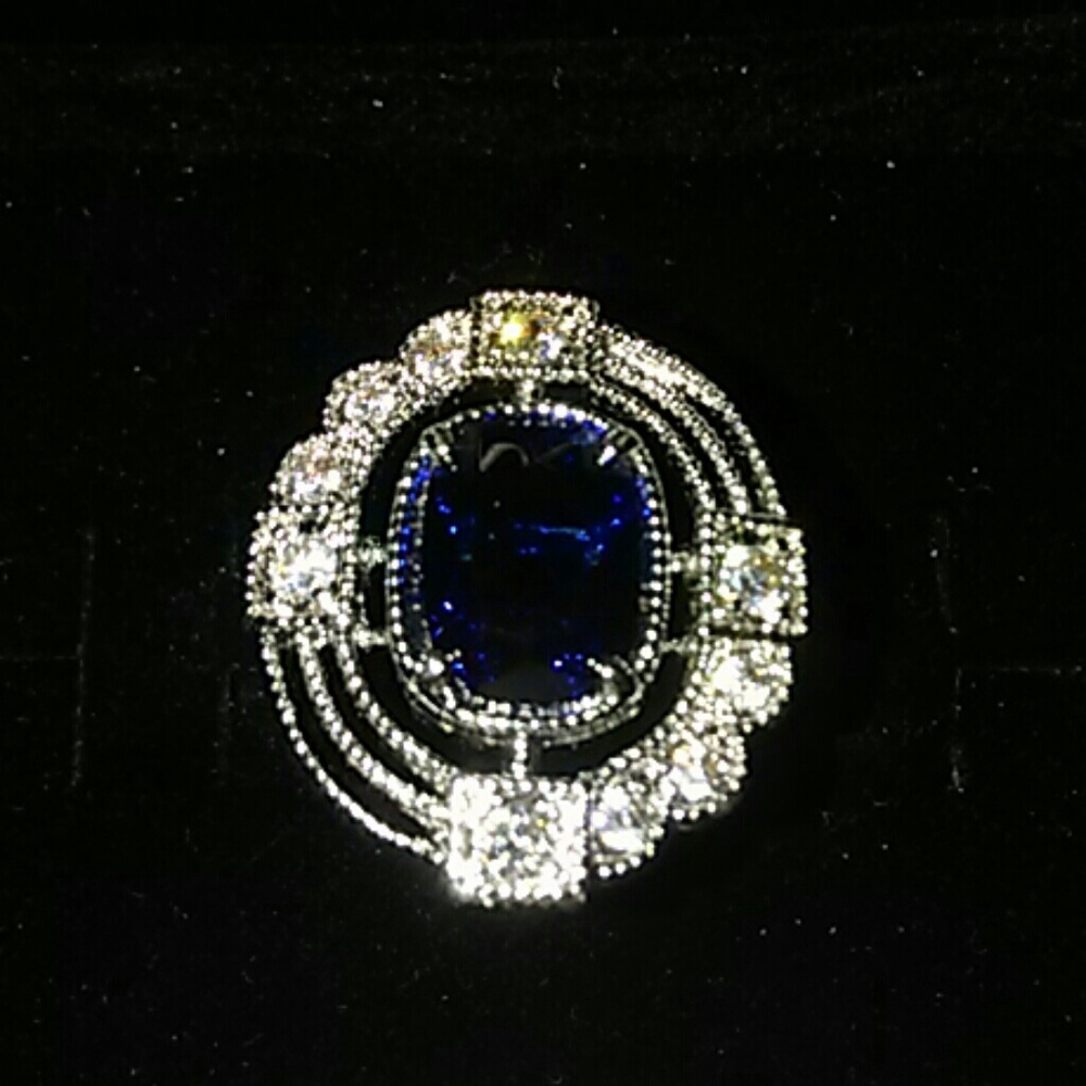 Sapphire blue and white ring set in silver